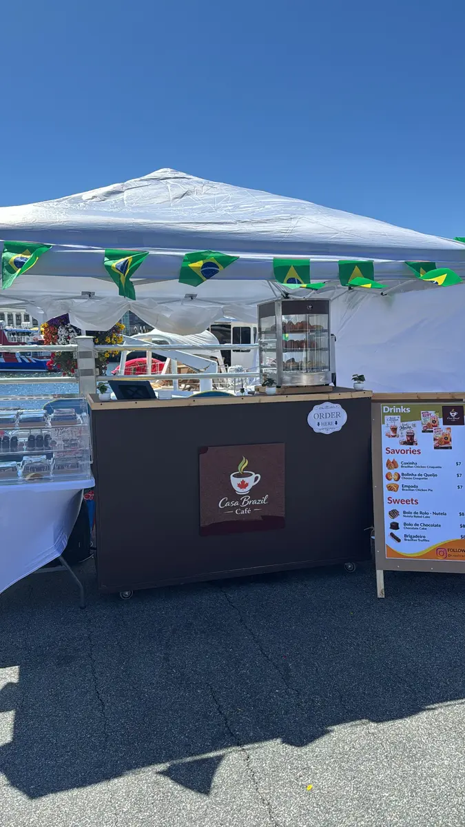 The Casa Brazil Café stand at a local outdoor market